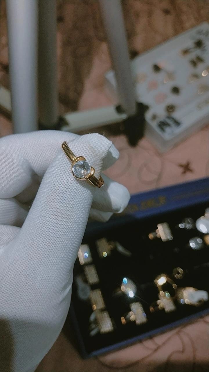 Classic Solitaire Gold Ring with Heart Accent Setting