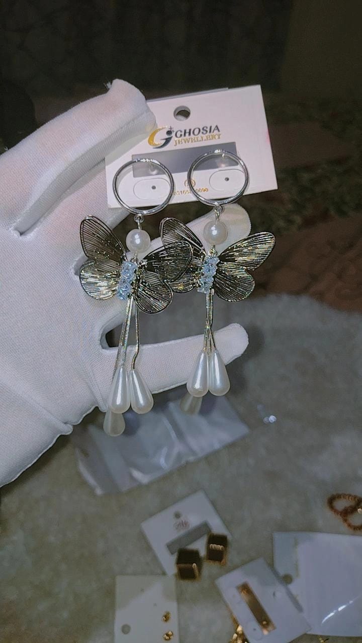 Elegance in Motion: Butterfly & Pearl Dangle Earrings