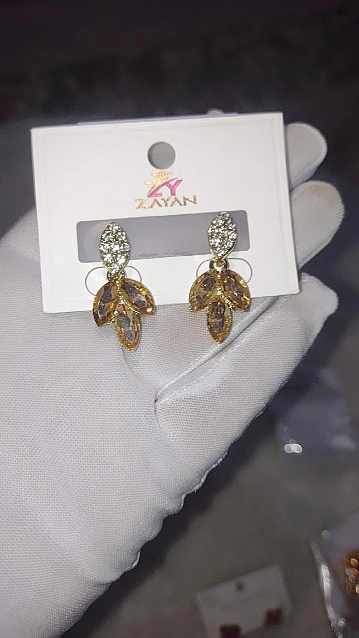 Nature-inspired, leaf-cluster drop/dangle earrings.