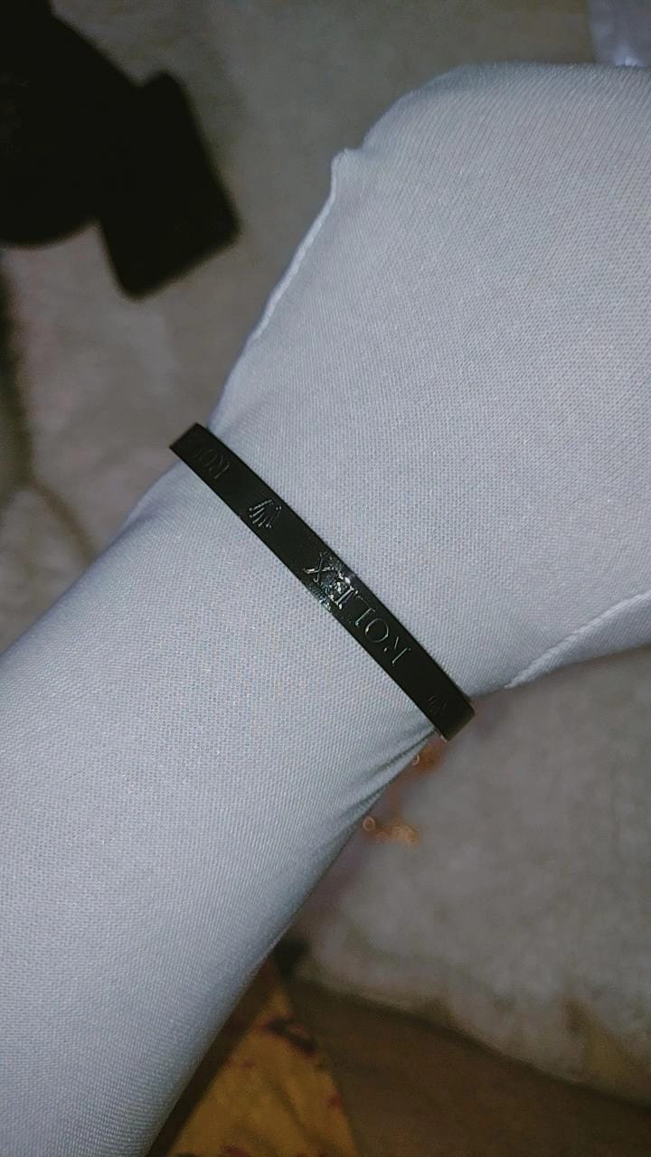 Slim, open-style cuff bracelet with a modern aesthetic