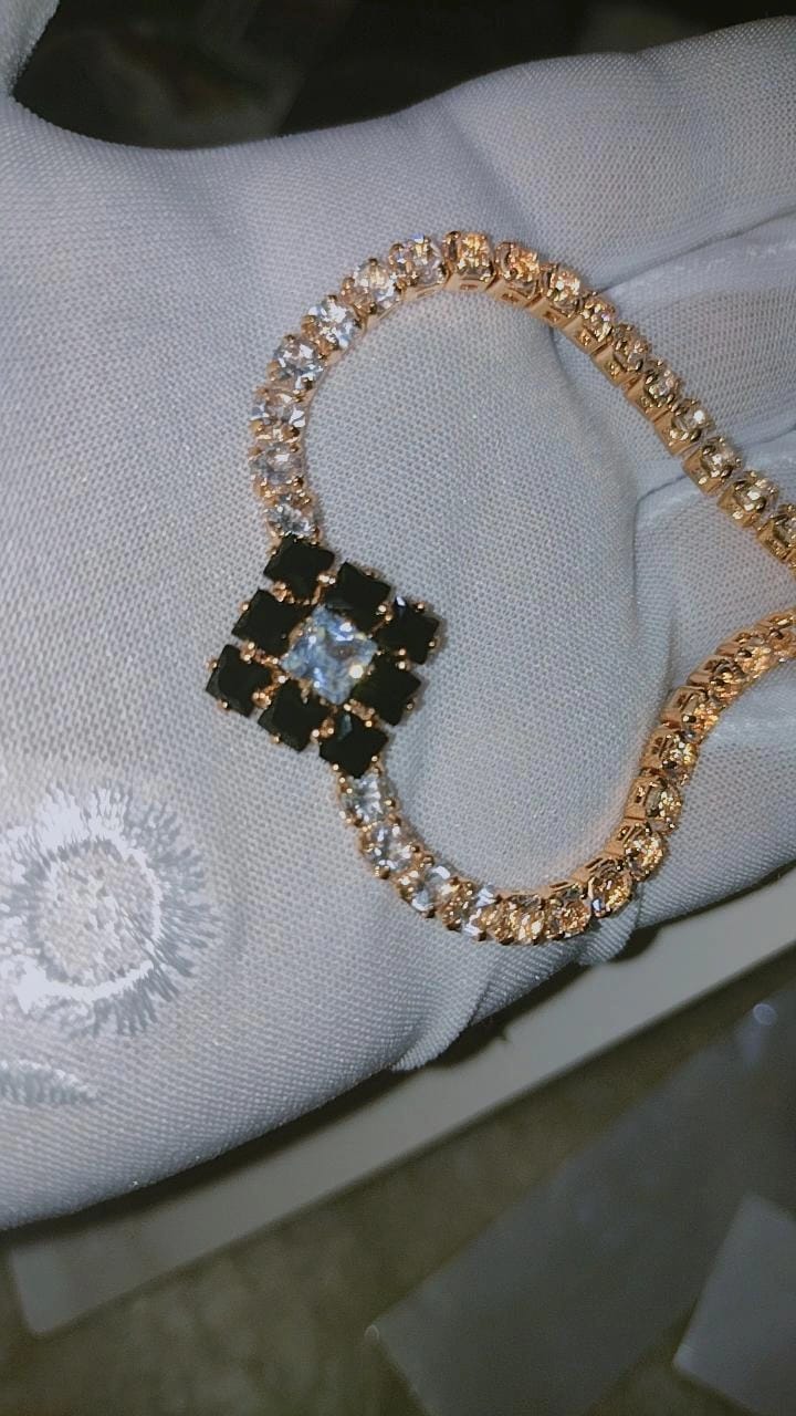 A geometric diamond-shaped clust bracelet
